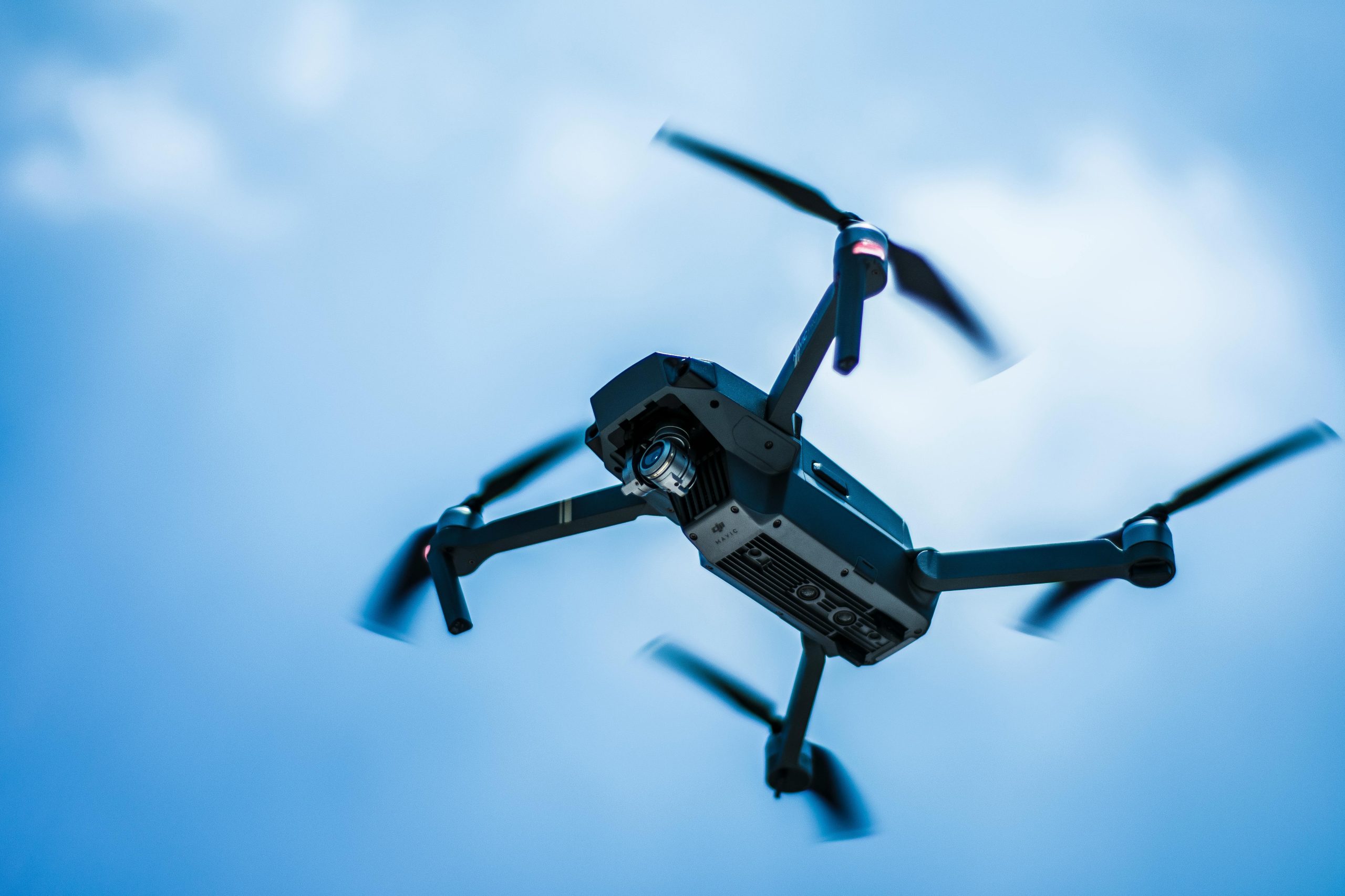 Black drone flying.