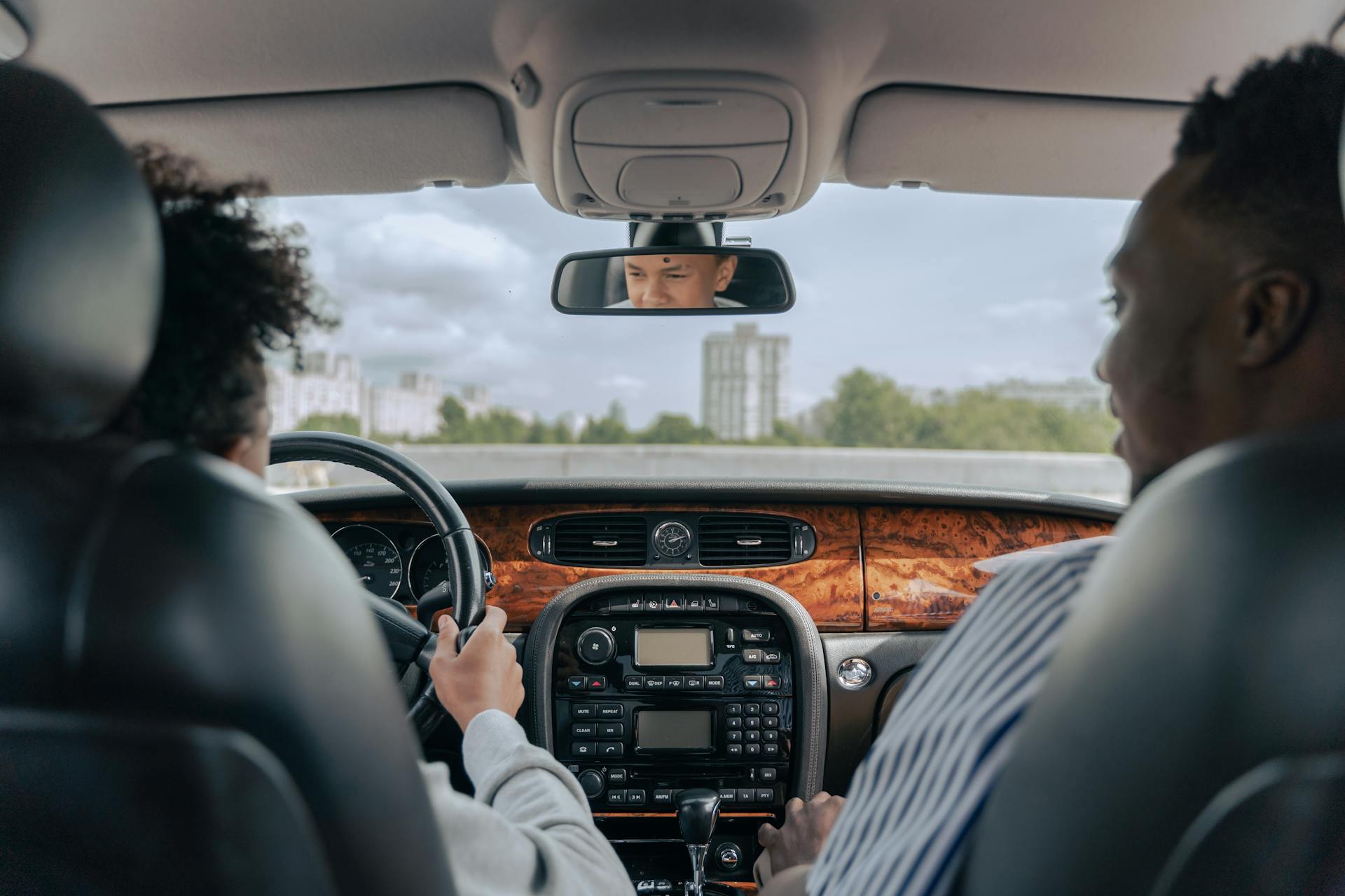 A young driver is learning to drive.