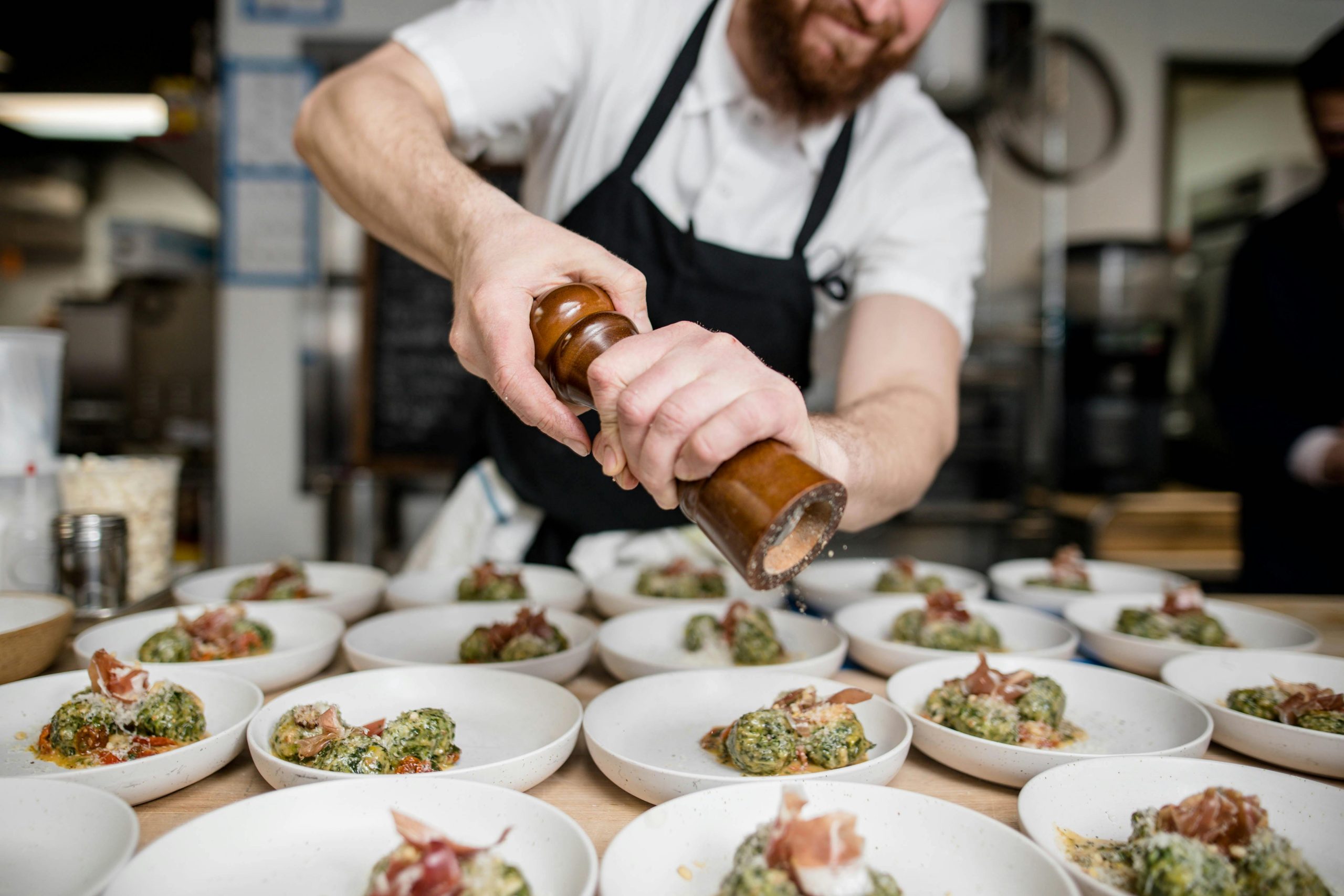 Chef adds some pepper