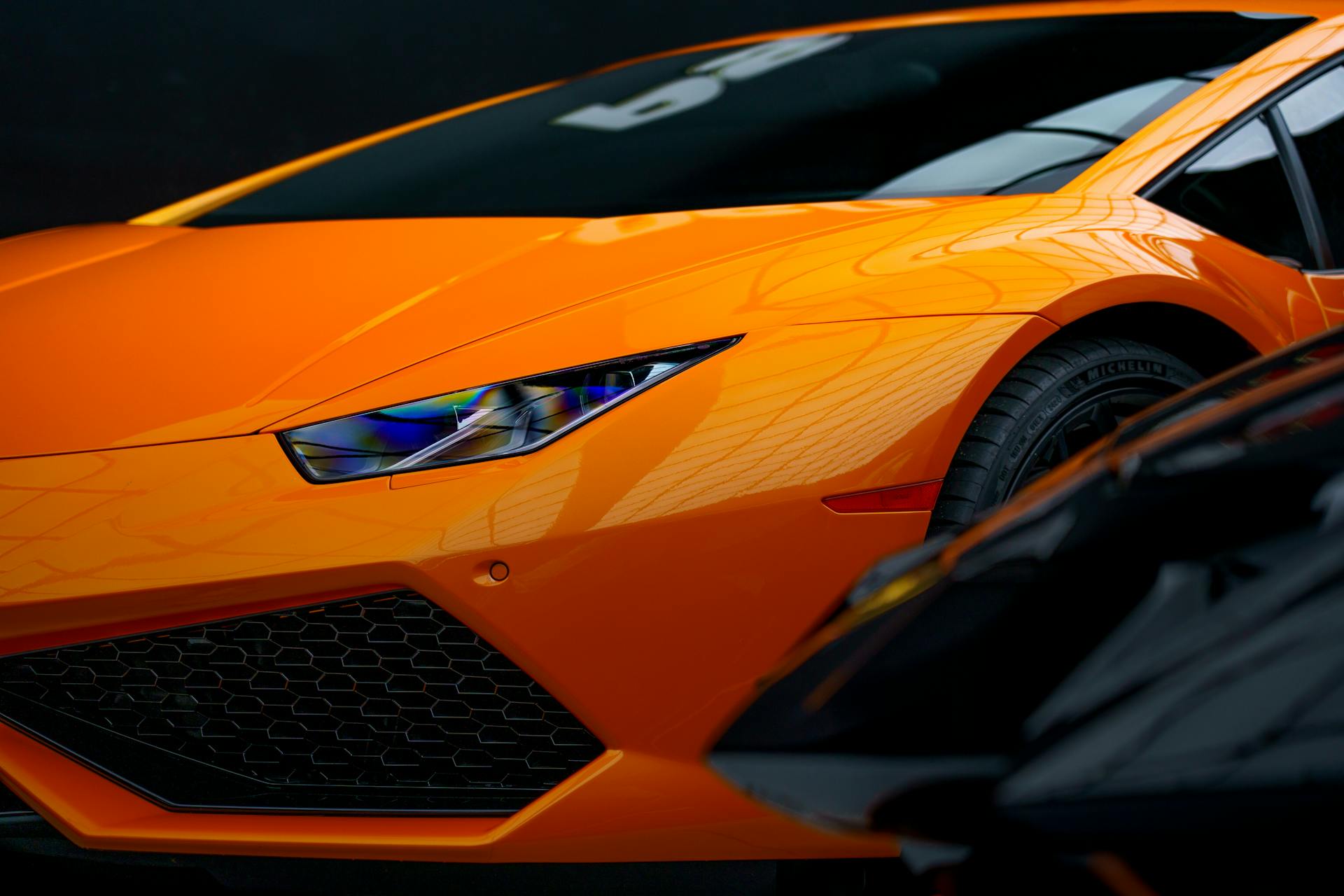 Bright orange luxury sports car.